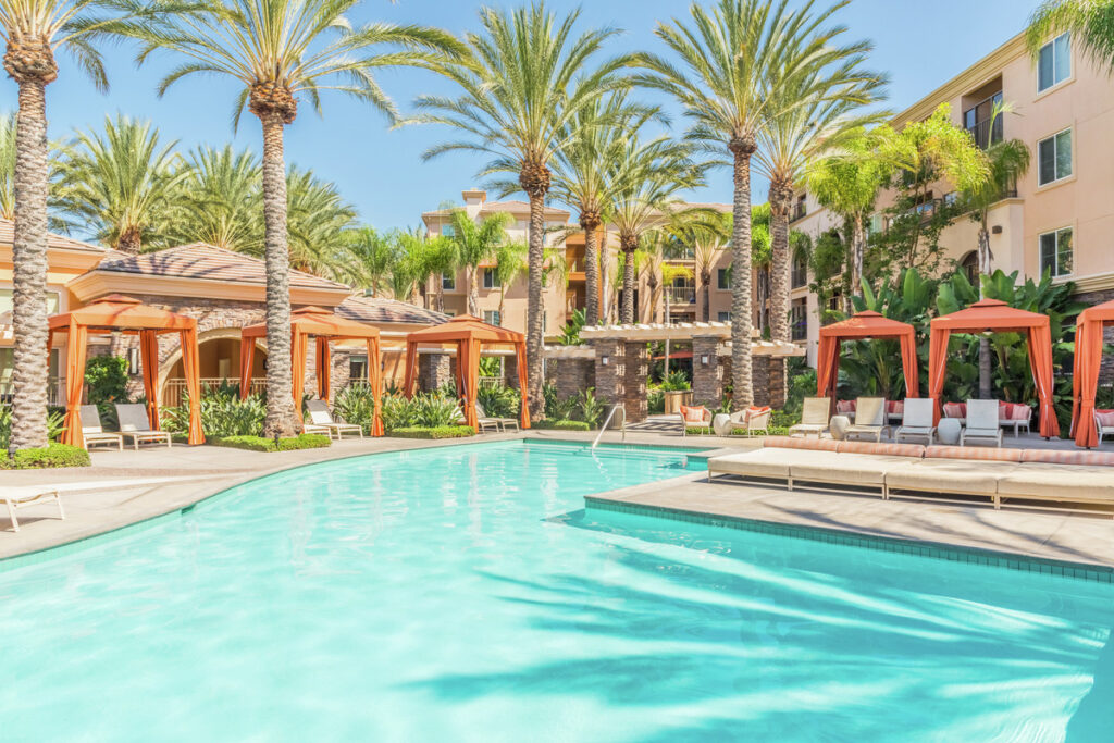 View of pool and cabanas at Gateway Apartment Homes